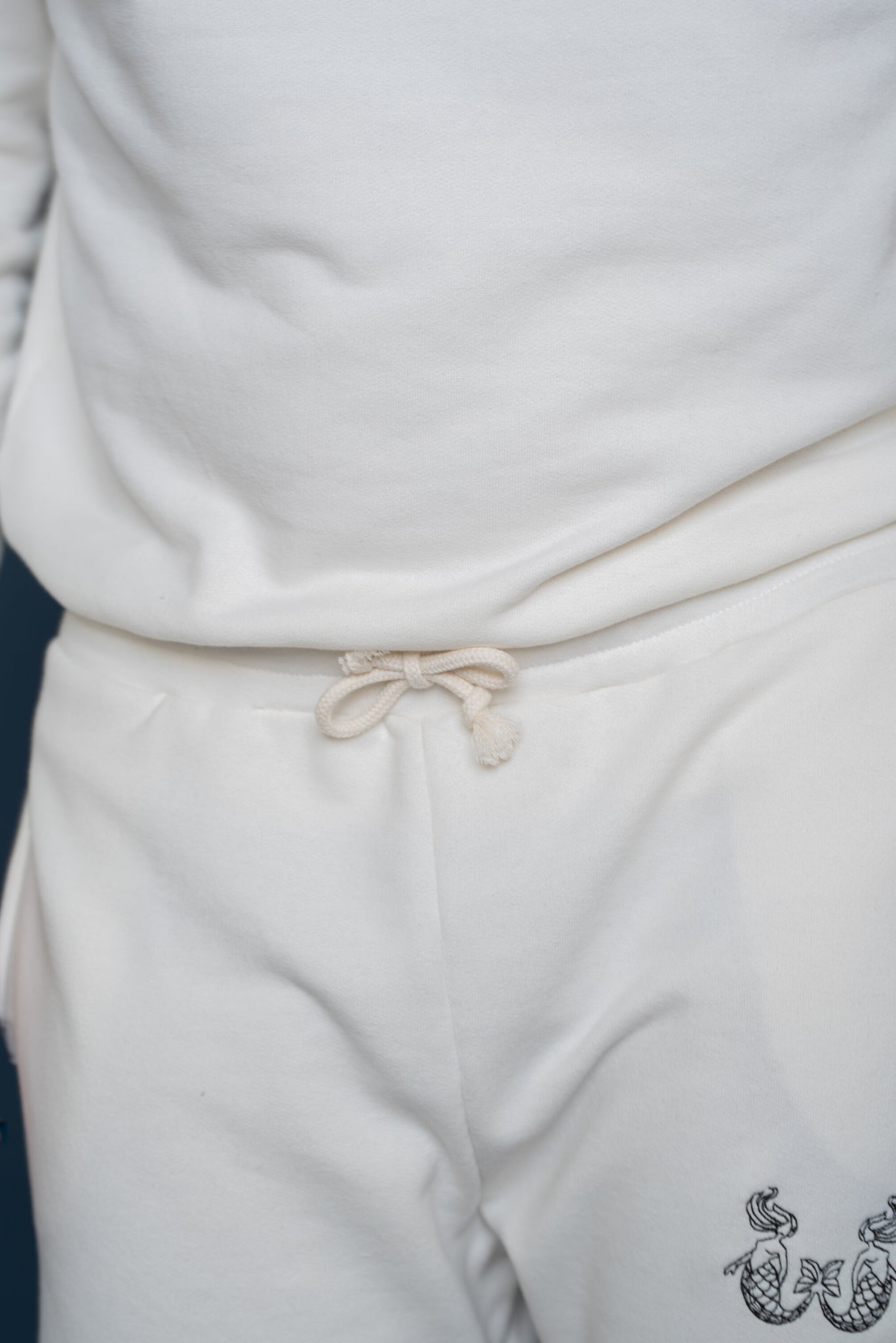 Embroidered Cotton Joggers in Off-white